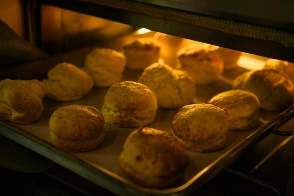 Image of doughs being baked in a gas oven
