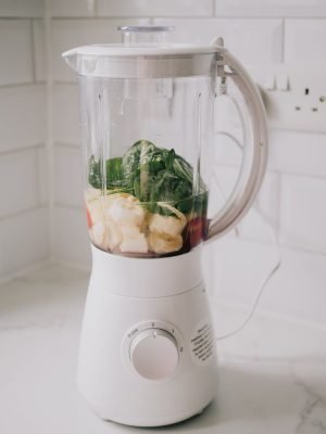 white blender to showcase the difference food processor vs blender