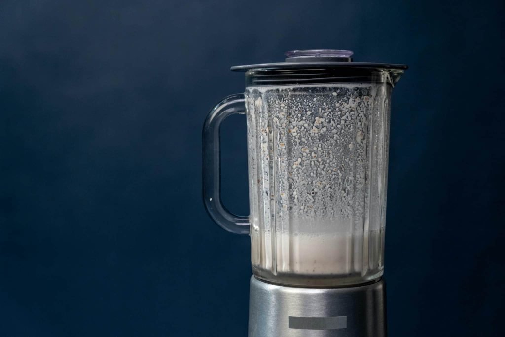 Close up of a blender whilst making a smoothie to showcase the difference Juicer vs blender