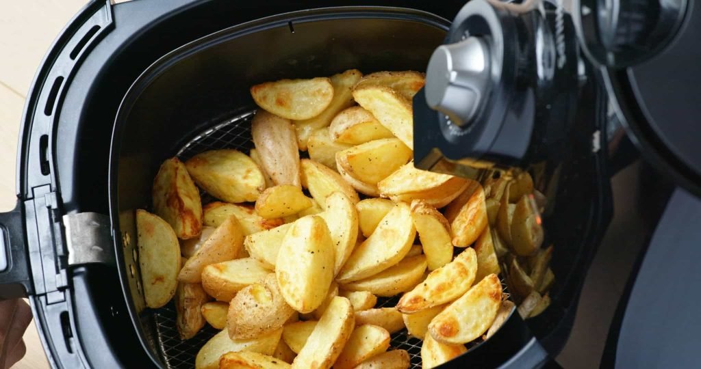 French Fries in an air fryer to showcase the difference of Halogen Ovens vs Air Fryers
